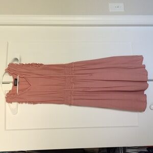 Knee length rose pink colored sleeveless dress by Gigio. Size small.